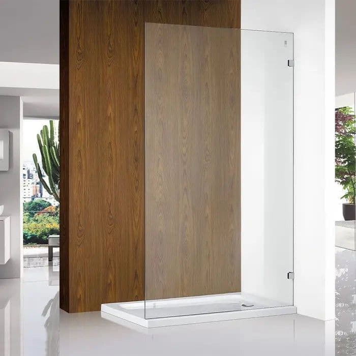 Frameless fixed shower panel with brushed nickel hinges and clips mounted directly onto clear glass, set against a timber-clad wall with a white shower tray base.